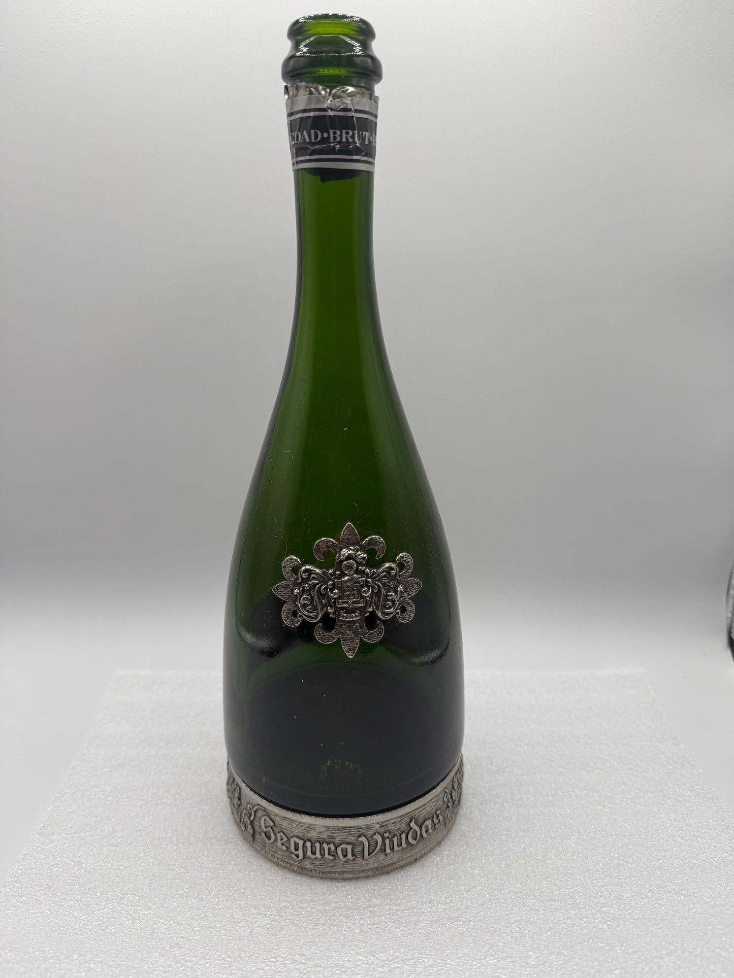 Segura Viudas Brut Reserva Heredad Green Wine Bottle with Pewter Crest and Base
