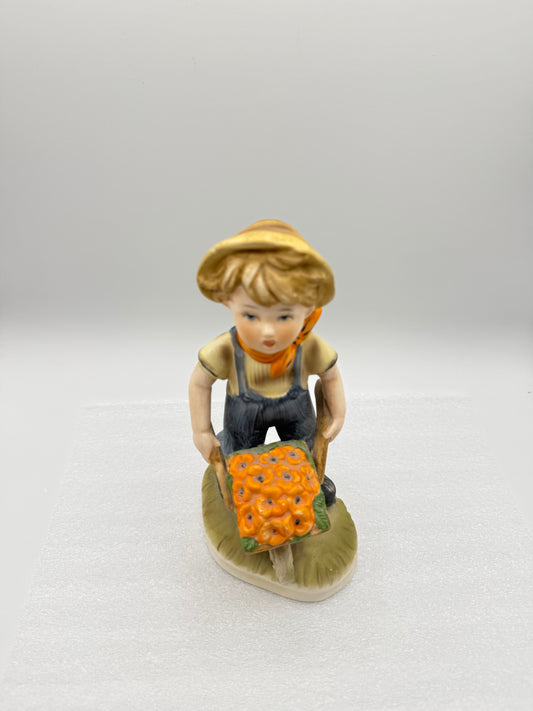 Figurine of Boy with Wheelbarrow